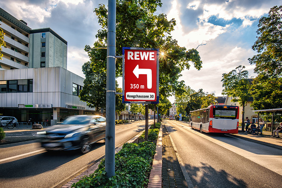 Rewe_Hinweisschild_web